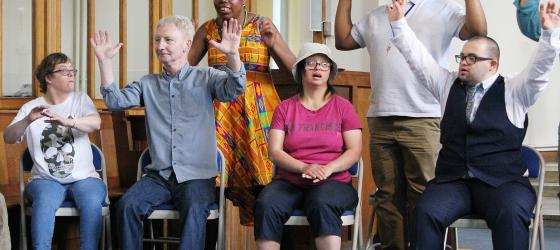 Adults with learning disabilities in group class